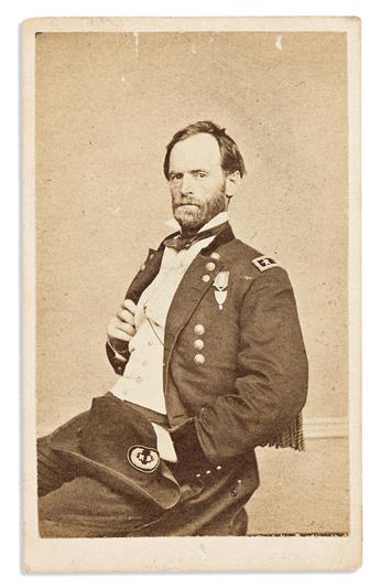 SHERMAN, WILLIAM T. Signature and rank, (W.T. Sherman / Maj Genl), on verso of carte-de-visite photograph, half-length portrait of h